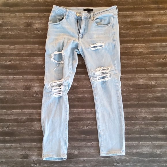 Light Blue Distressed Skinny Jeans with Frayed Rips - Picture 1 of 2
